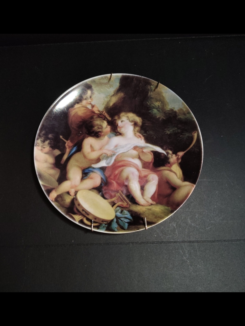 Decorative Porcelain Wall Plate with Cherub Scene in Pastel Tones